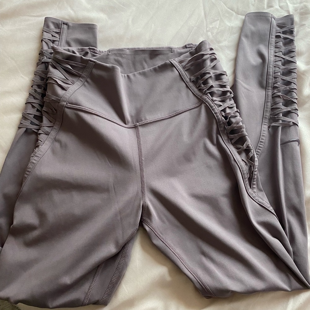purple criss cross nike leggings